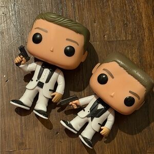 Funko Pop Figures in White and Black Suits